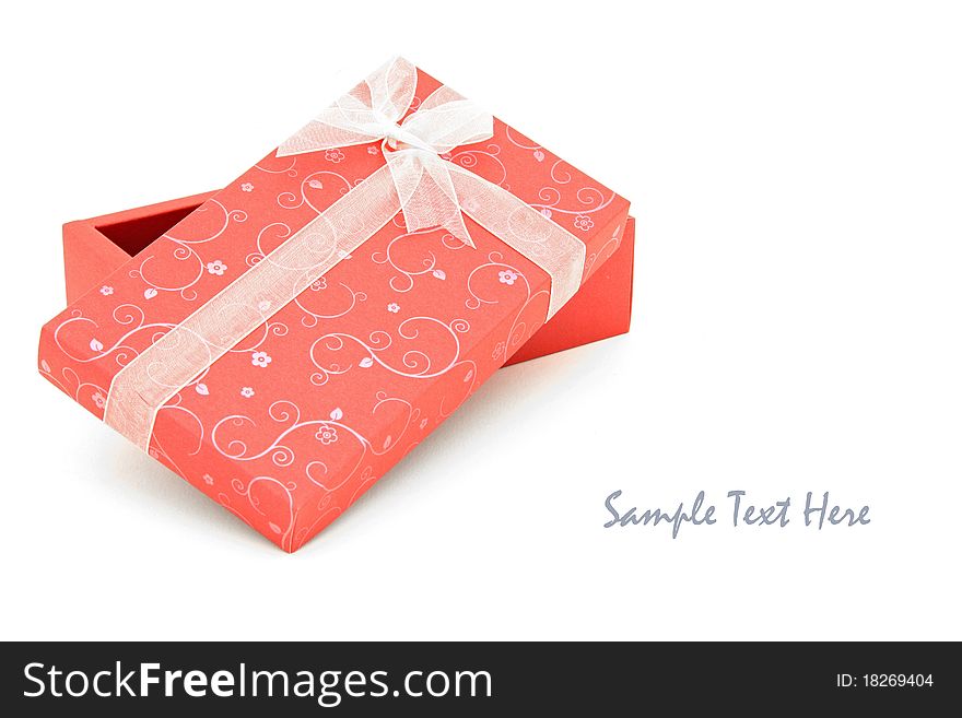 Perspective of isolated open red holiday gift box with space for text