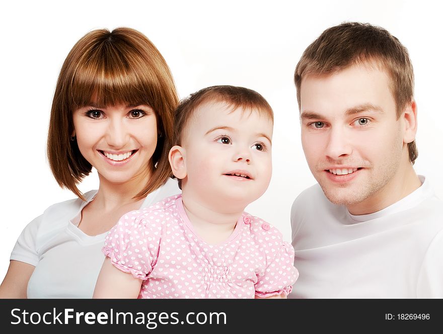 Happy family with a baby on a white background