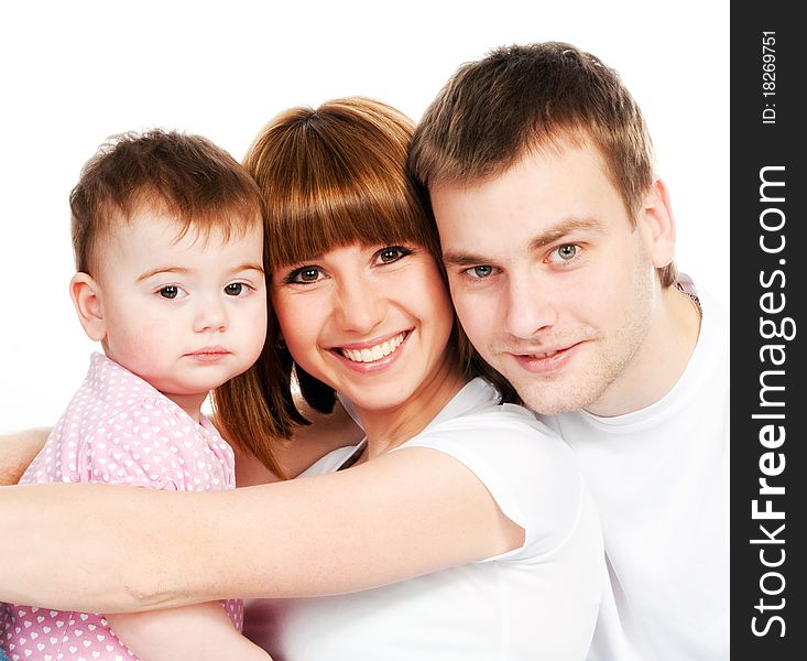 Happy family with a baby on a white background