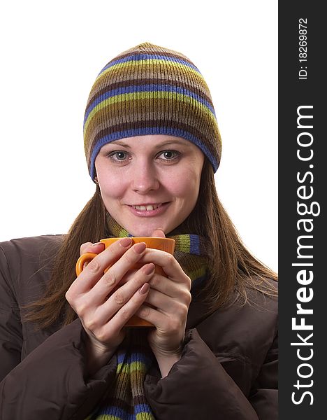 Young woman with orange cup in the hands isolated over white background. Young woman with orange cup in the hands isolated over white background