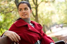 Woman Sitting In A Park On A Wooden Bench, Royalty Free Stock Images Woman Sitting In A Park On A Wooden Bench, Royalty Free Stock Images