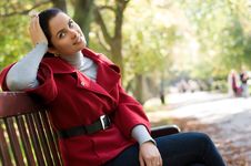 Woman Sitting In A Park On A Wooden Bench, Royalty Free Stock Photo Woman Sitting In A Park On A Wooden Bench, Royalty Free Stock Photo