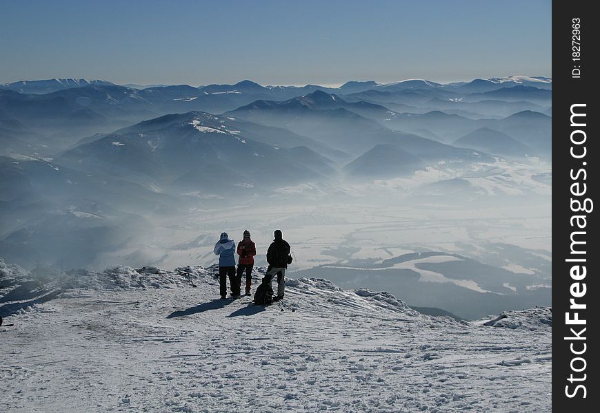 Tourist - three people on winter mountains trip