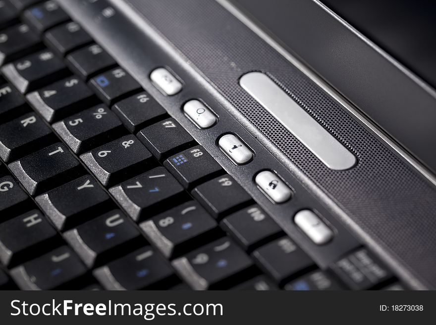 Close-up of a laptop keyboard in black