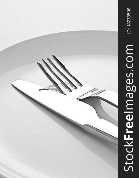 Fork and knife on white background