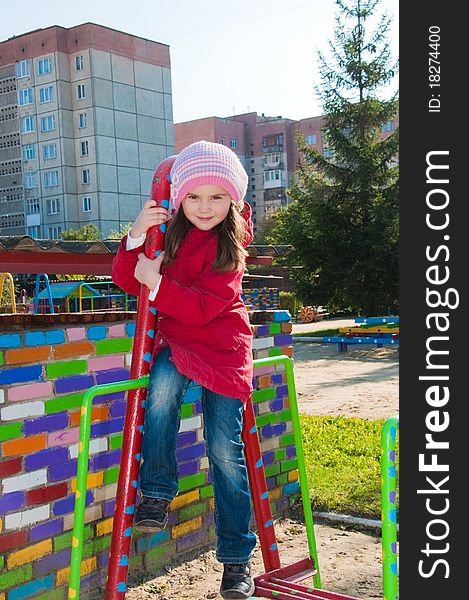 Smiling little girl at the playground