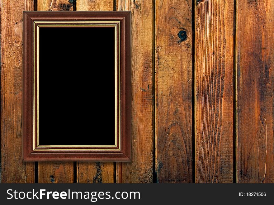 Vintage frame on wooden wall