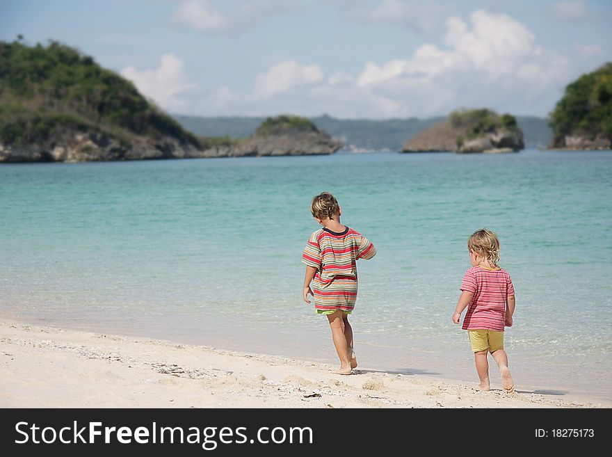 Two children playing on beach. Two children playing on beach