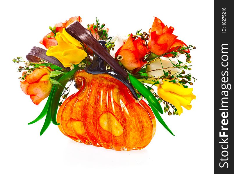 Orange roses in the vase isolated over white background