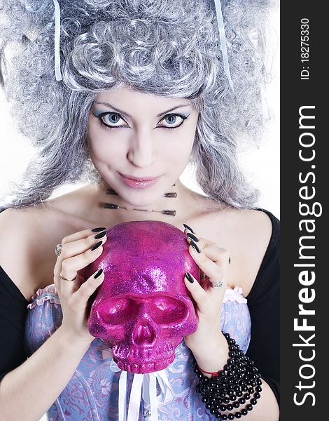 Goth woman in a wig with a skull