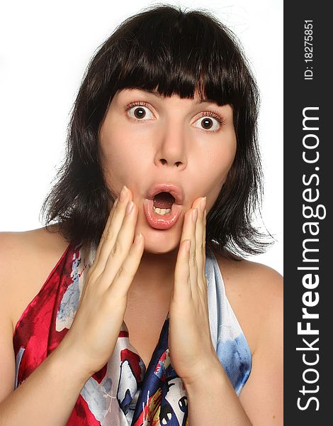 Portrait Of A Surprised Girl On A White Background