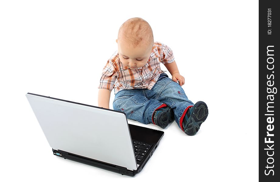 Baby boy using laptop on white background. Baby boy using laptop on white background