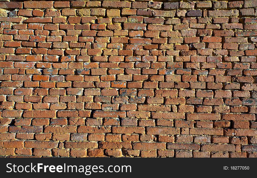 Pattern of an old rusty brick red wall. Pattern of an old rusty brick red wall.