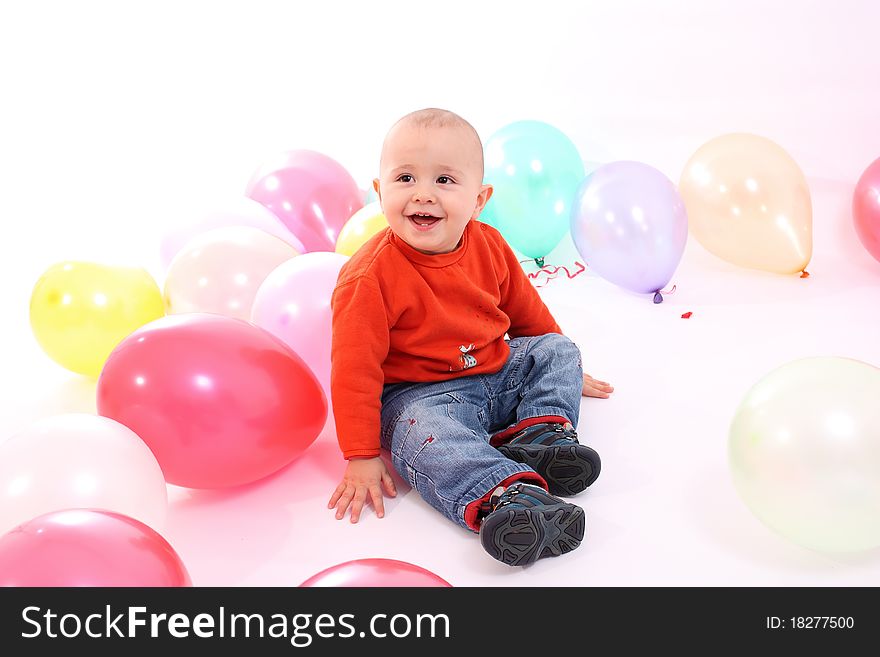 Happy baby boy with balloons on white background. Happy baby boy with balloons on white background