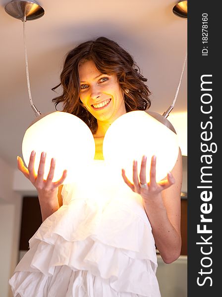 Young girl holding a light lamps. Young girl holding a light lamps