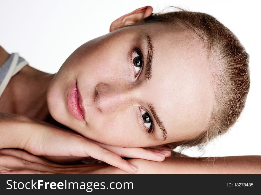 Portrait of attractive beautiful young girl posing on white background. Portrait of attractive beautiful young girl posing on white background