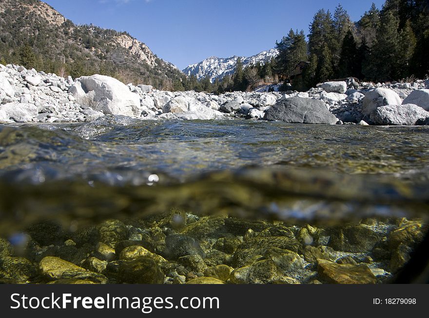 Underwater photograph of a mountain creek. Underwater photograph of a mountain creek