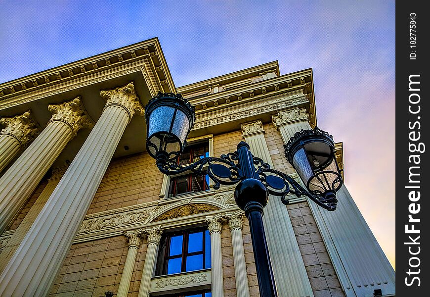 Street lamp and corner of a building.