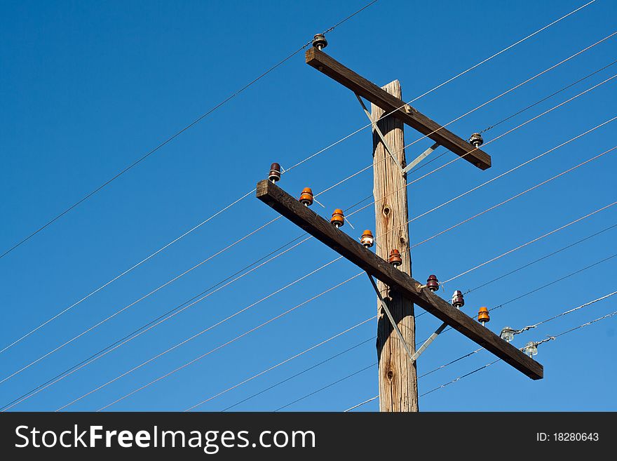 A photograph of and old power line. This could represent past energy methods, and a new renewable alternative energy. A photograph of and old power line. This could represent past energy methods, and a new renewable alternative energy.