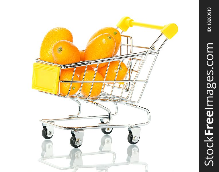 Tangerine in the shopping cart. Isolated.