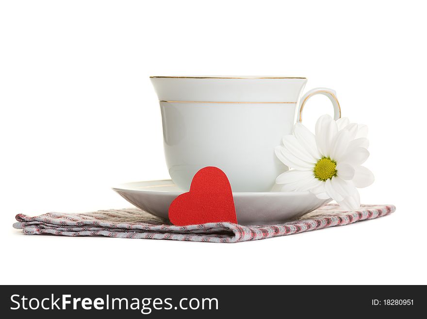 Cup of tea with heart shape on napkin (Valentine's day or Love concept). Cup of tea with heart shape on napkin (Valentine's day or Love concept)