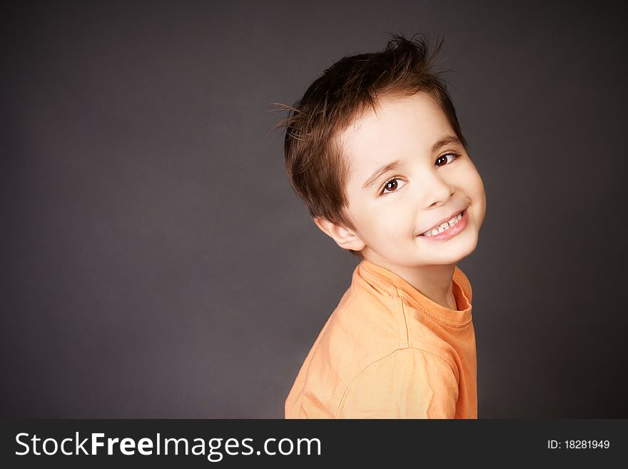 Portrait of happy smiling beautiful little boy, studio shot. Portrait of happy smiling beautiful little boy, studio shot