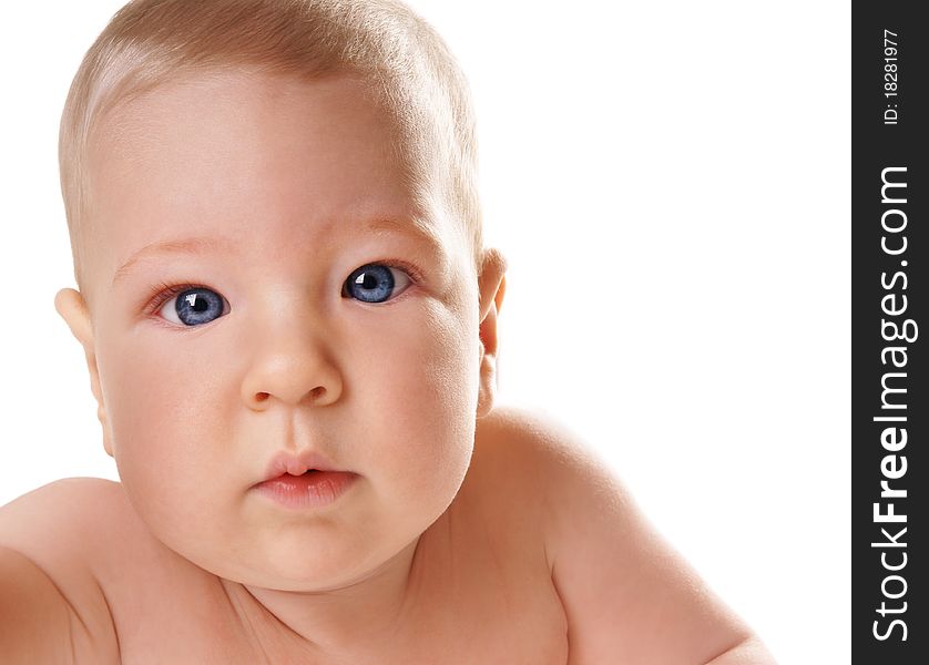 Close-up portrait of cute baby-boy with blue eyes on white background