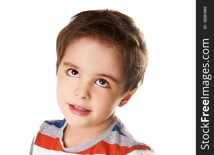 Portrait of thoughtful little smiling boy looking up on white background. Portrait of thoughtful little smiling boy looking up on white background