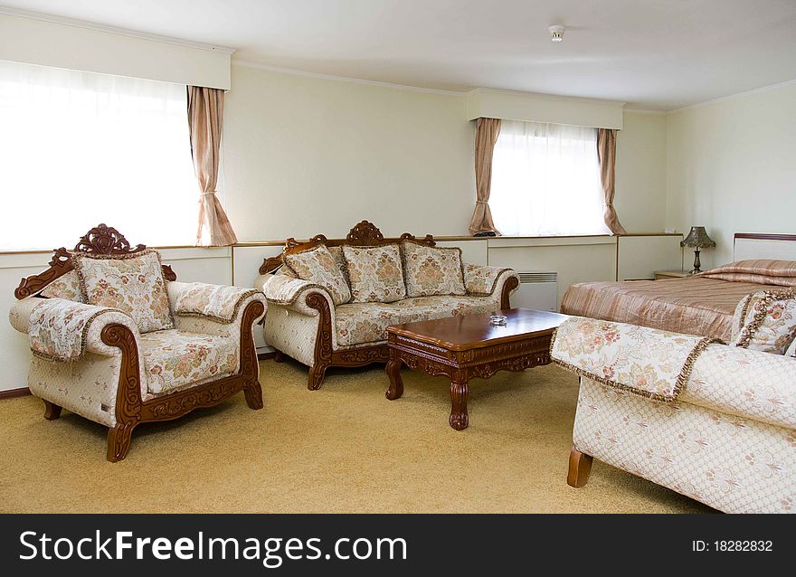 Hotel room with beautiful interior design. Sofa