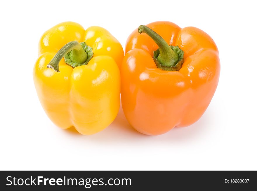 Two pepper isolated on white background