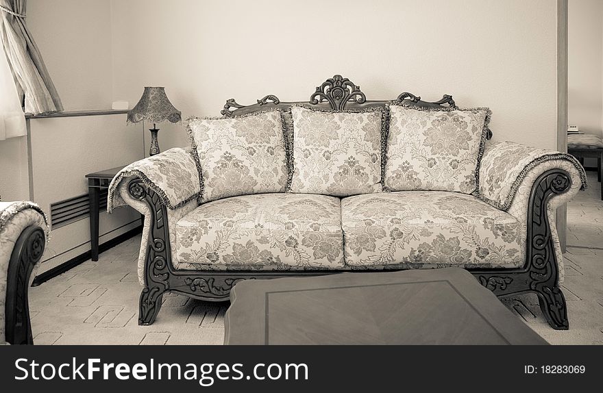 Hotel room with beautiful interior design. Sofa