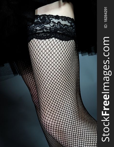 legs in black lace provocative stockings under skirt. legs in black lace provocative stockings under skirt