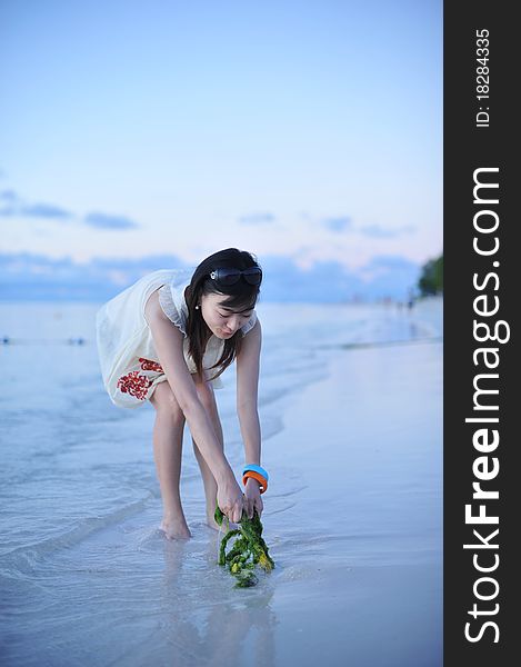 Asian Girl on the beach of Saipan Island