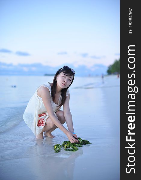 Asian Girl on the beach of Saipan Island