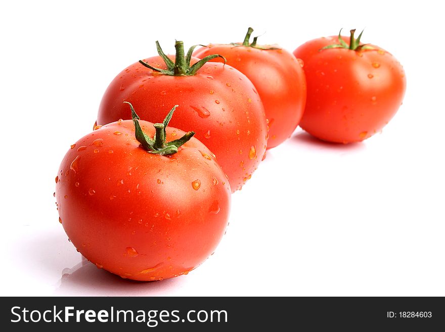 Fresh,colorful tomatoes isolated on white background. Fresh,colorful tomatoes isolated on white background