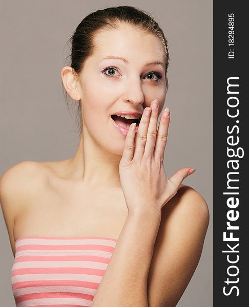 A beautiful young girl with a surprised look