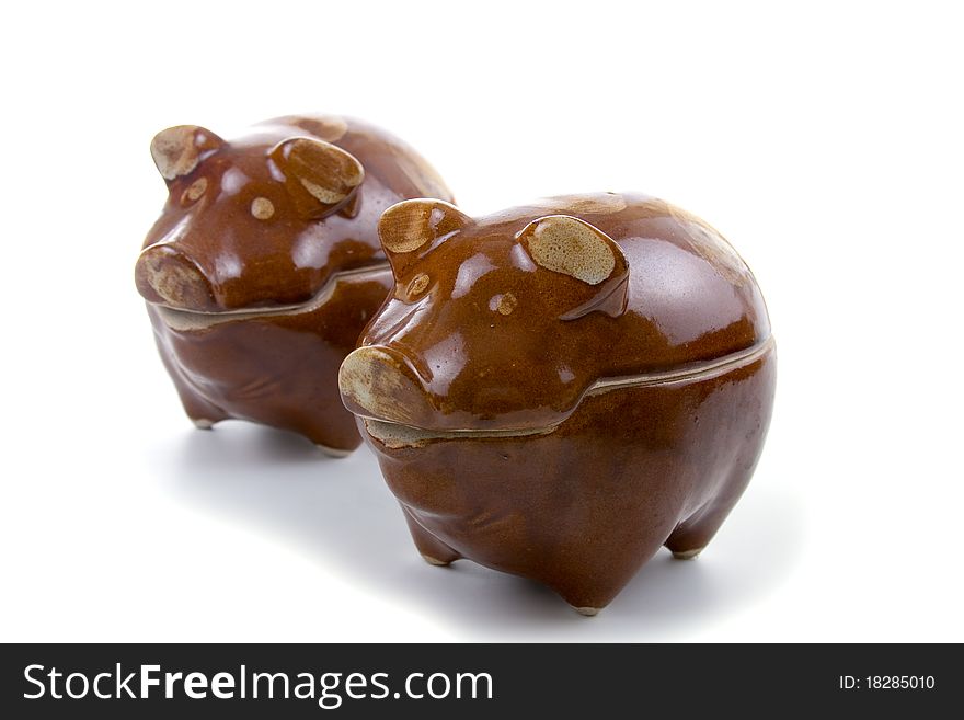 Ceramic piggy pots  a on a white background