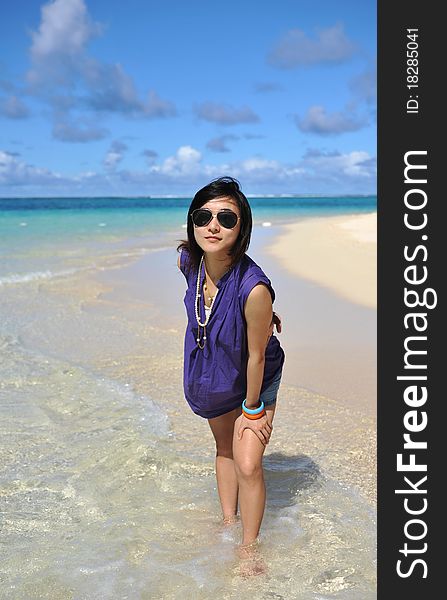 Asian Girl on the beach of Saipan Island