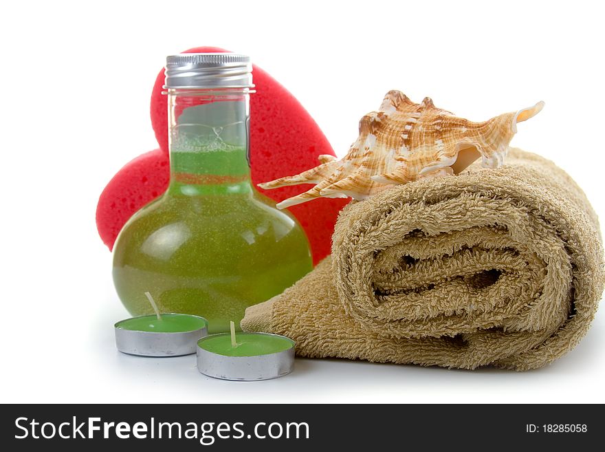 Spa still life with pink heart on white background