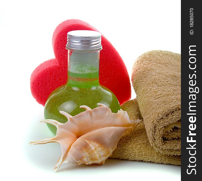 Spa still life with pink heart on white background