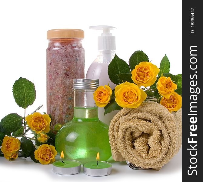 Spa still life with yellow roses on a white background