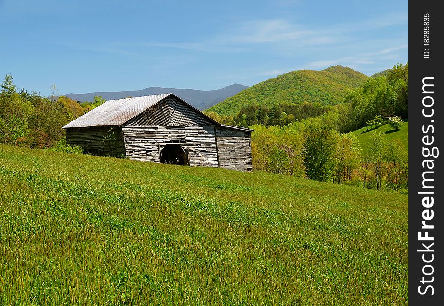 Mountain barn in spring