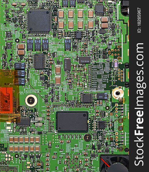 Detailed image of computer motherboard and integrated circuits. Detailed image of computer motherboard and integrated circuits.