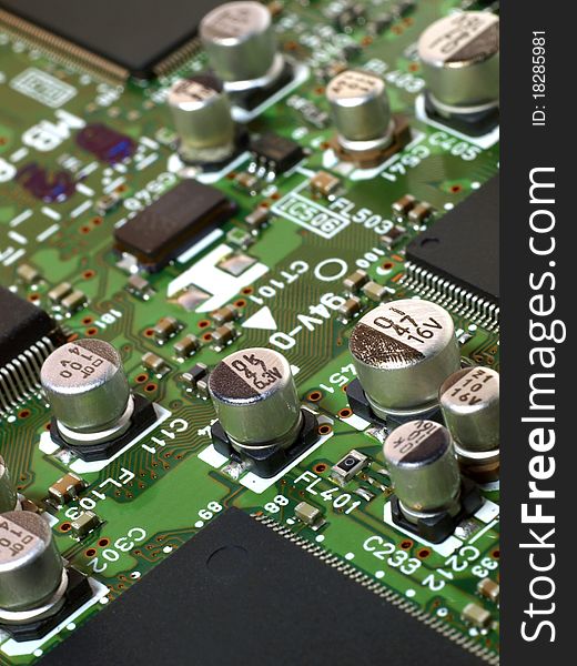 Detailed image of computer motherboard and integrated circuits. Detailed image of computer motherboard and integrated circuits.