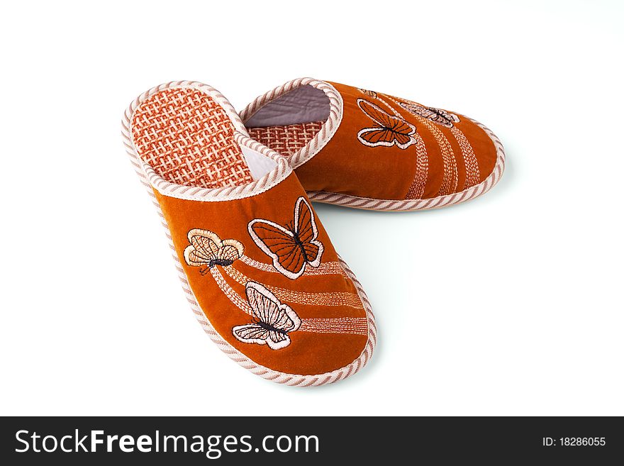 Slippers with butterflies on a white background.