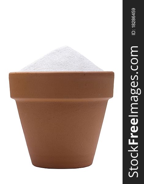 Clay pot for growing plants at home with white sand.