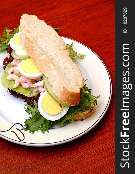 Sandwich with avocado and leaf lettuce