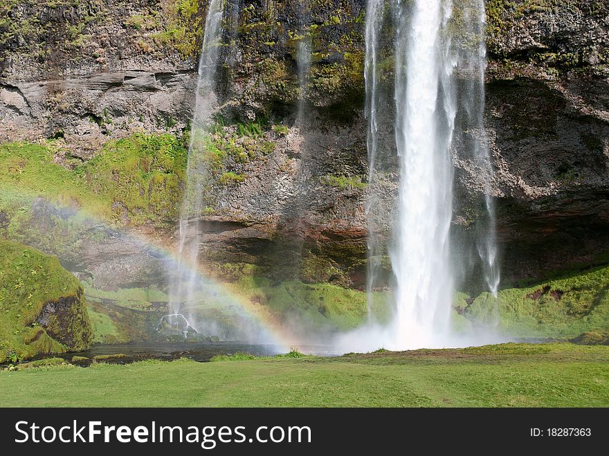 Rainbow over the waterfall of Seijalandfoss in Iceland. Rainbow over the waterfall of Seijalandfoss in Iceland
