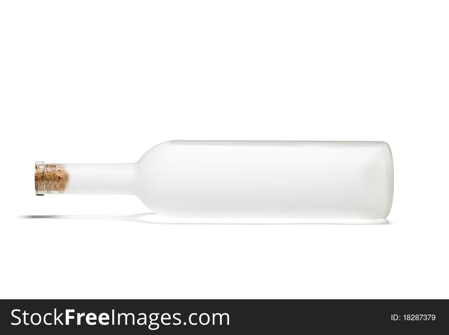 The white matte bottle closed by a fuse on a white background