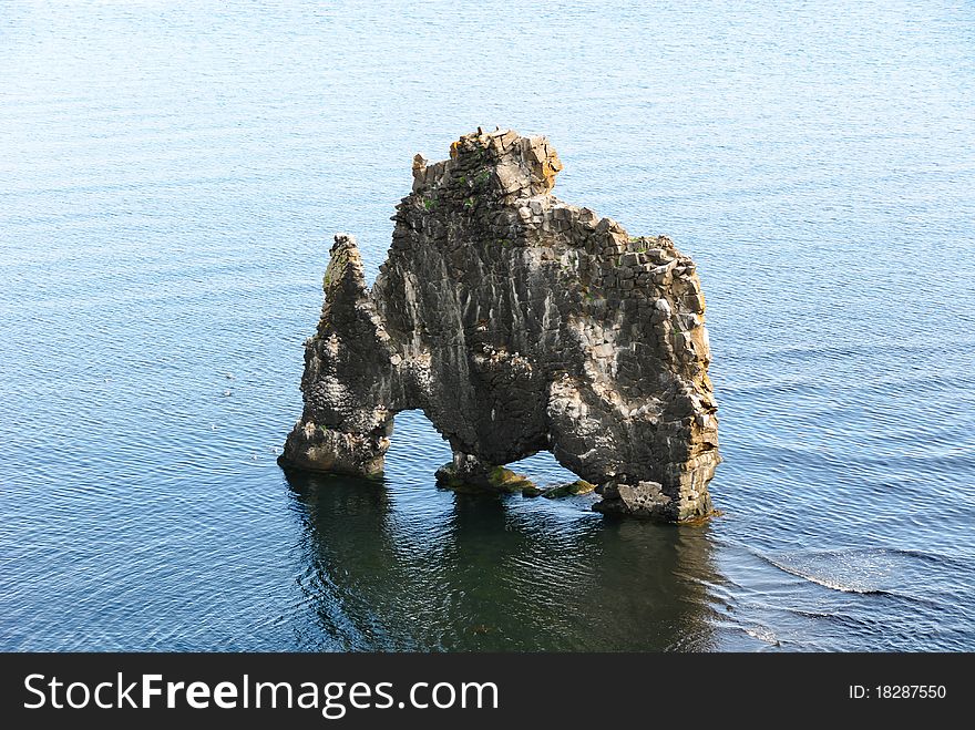 Lone rock in the sea in Iceland. Lone rock in the sea in Iceland
